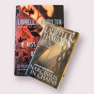 Laurel K. Hamilton - 1 Hardcover, 1 paperback books